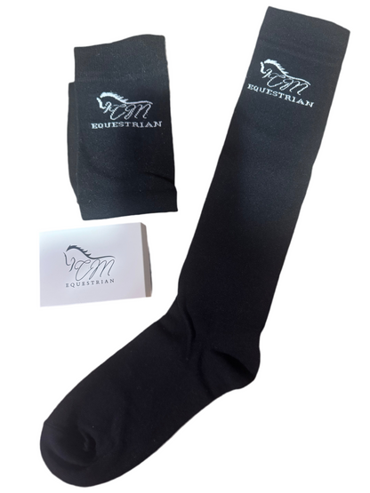 CM equestrian logo socks in black with White logo on the side.